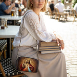 Catholight A Testament of Grace and Compassion Leather Crossbody Bag