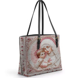Catholight  Sacred Serenity: The Madonna’s Tender Embrace Leather Tote Bag